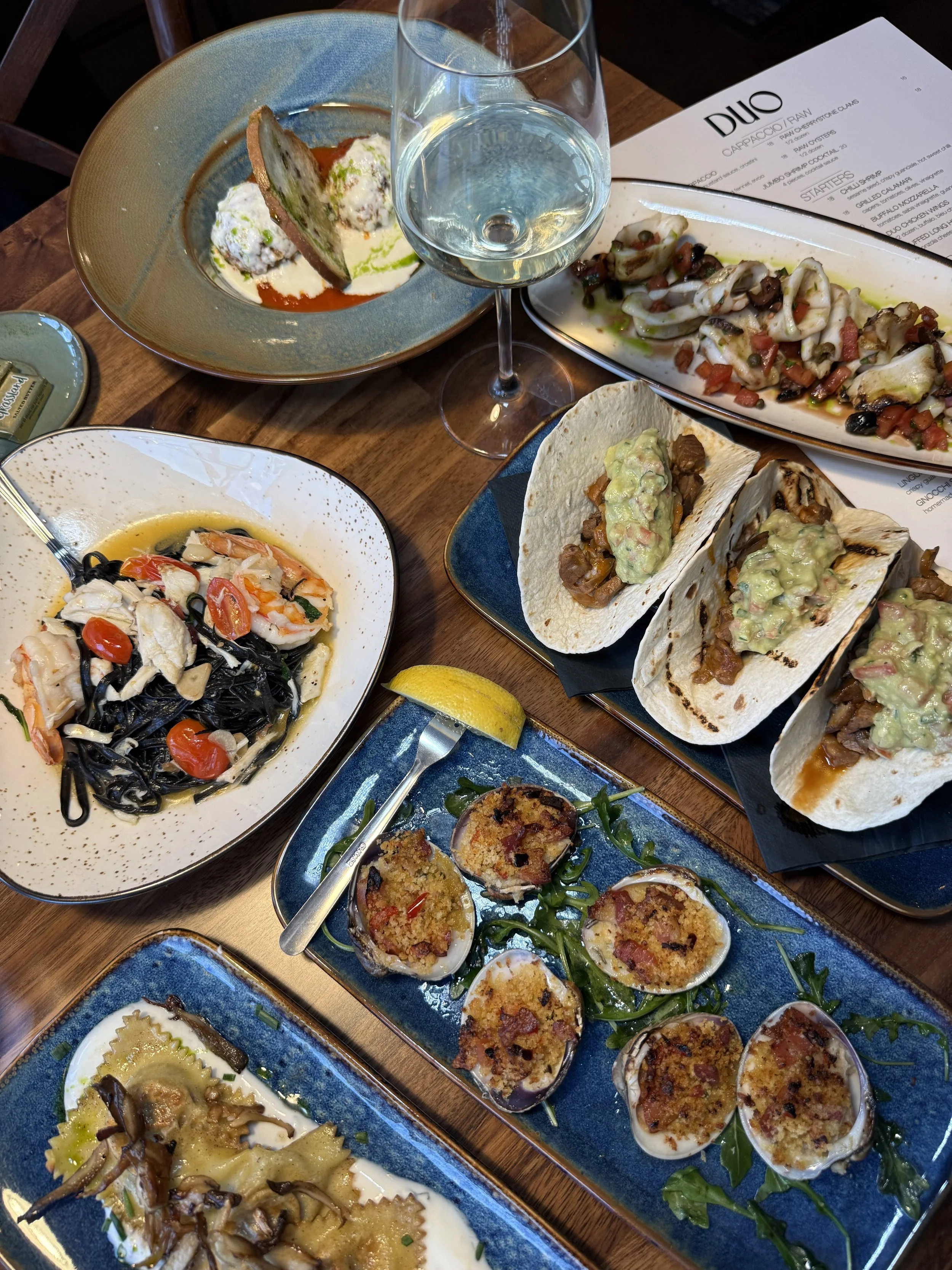 Table setting with Italian-inspired appetizers and small plates at Duo Restaurant & Bar in Haddon Township, NJ