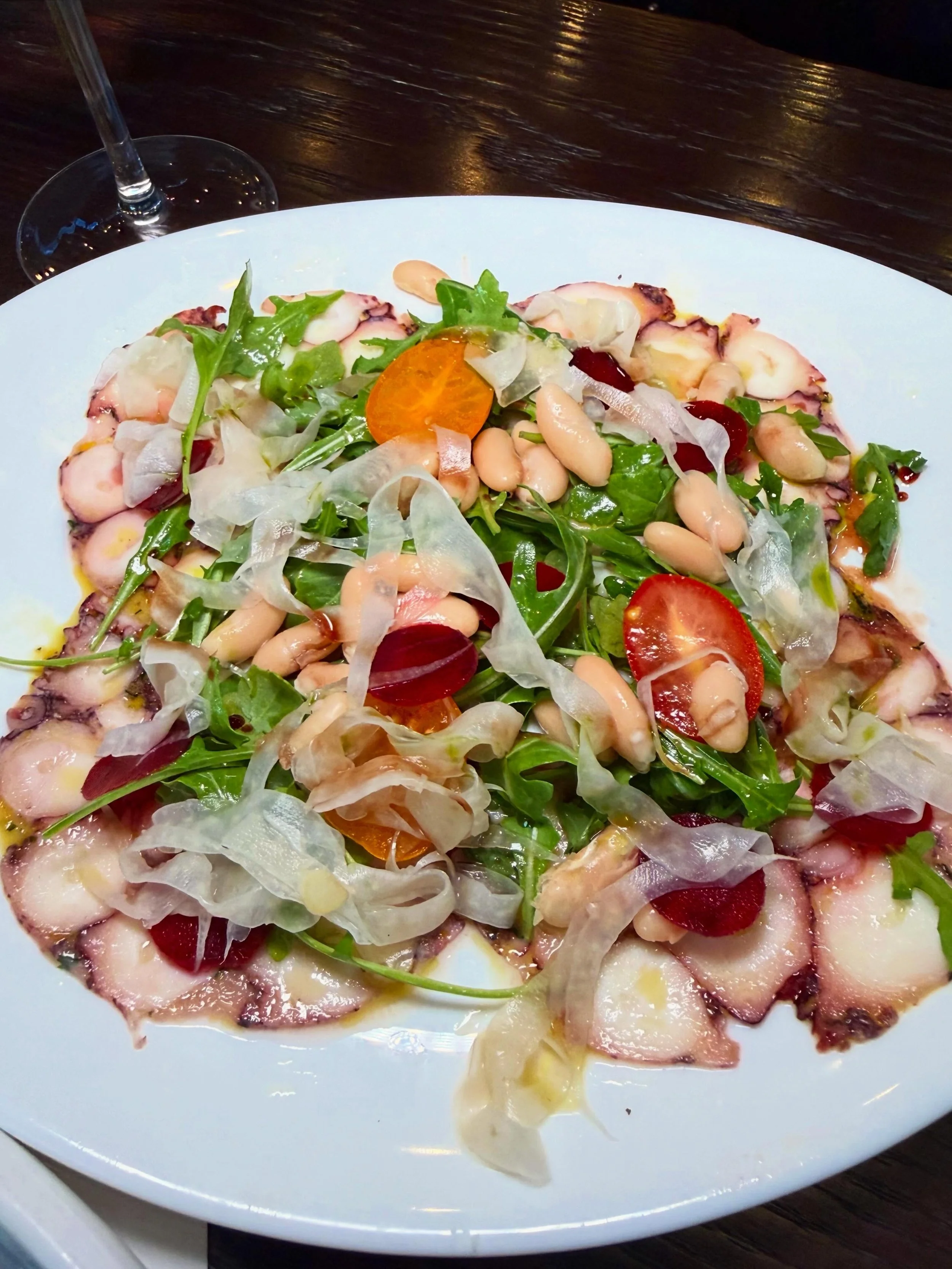 Our fresh octopus carpaccio is the perfect cold appetizer on a hot summer day!🐙🍋