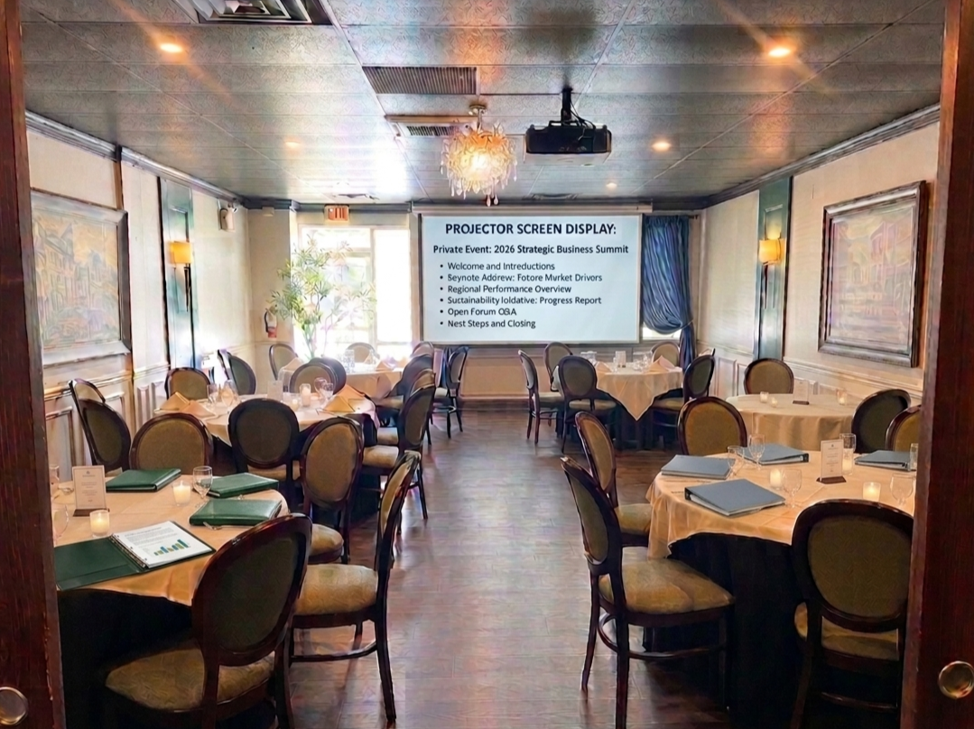 Our Private Room 1 set up for a business luncheon with a projector