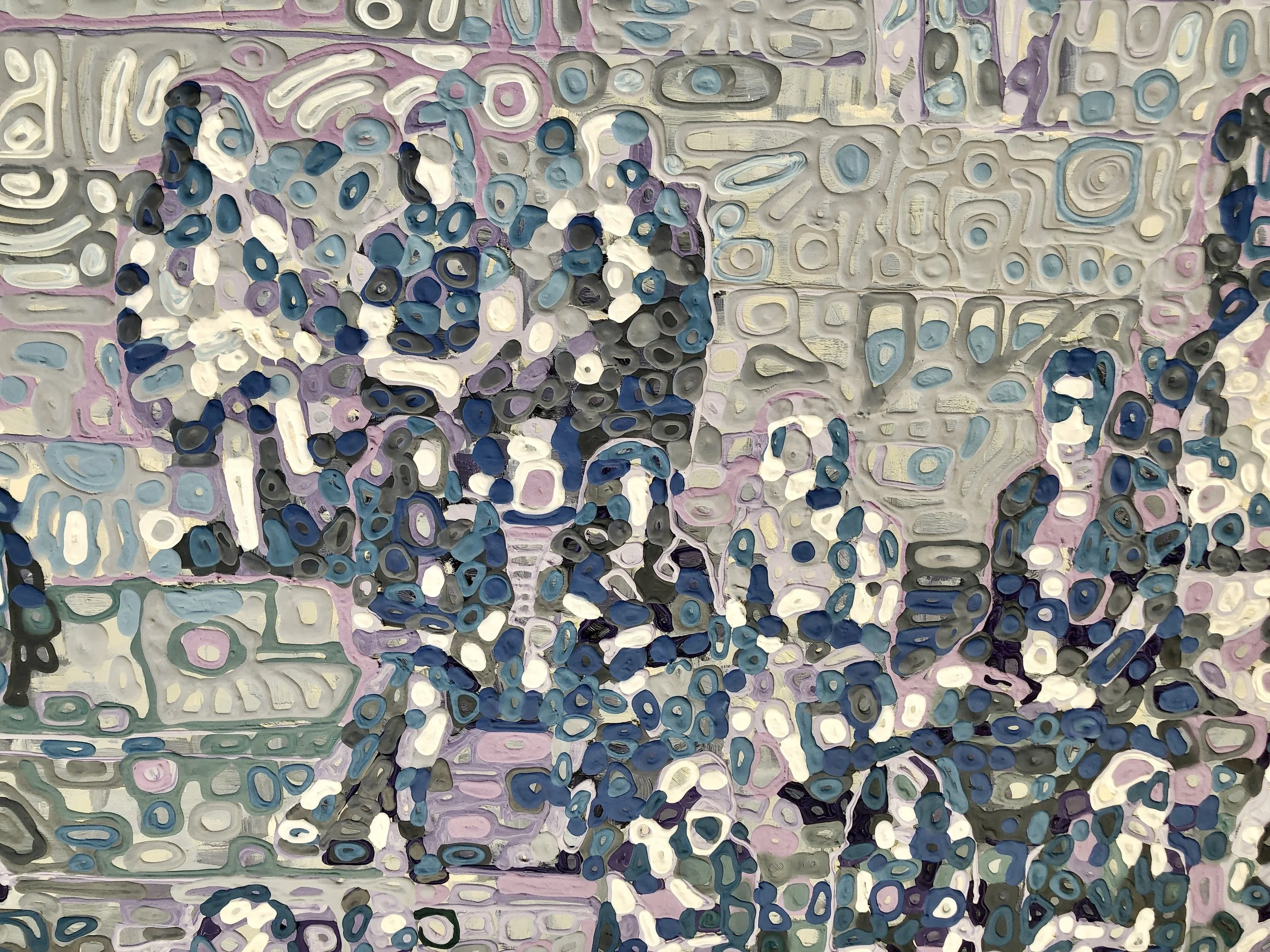 Paint built into raised forms, extending the pictorial surface into physical space