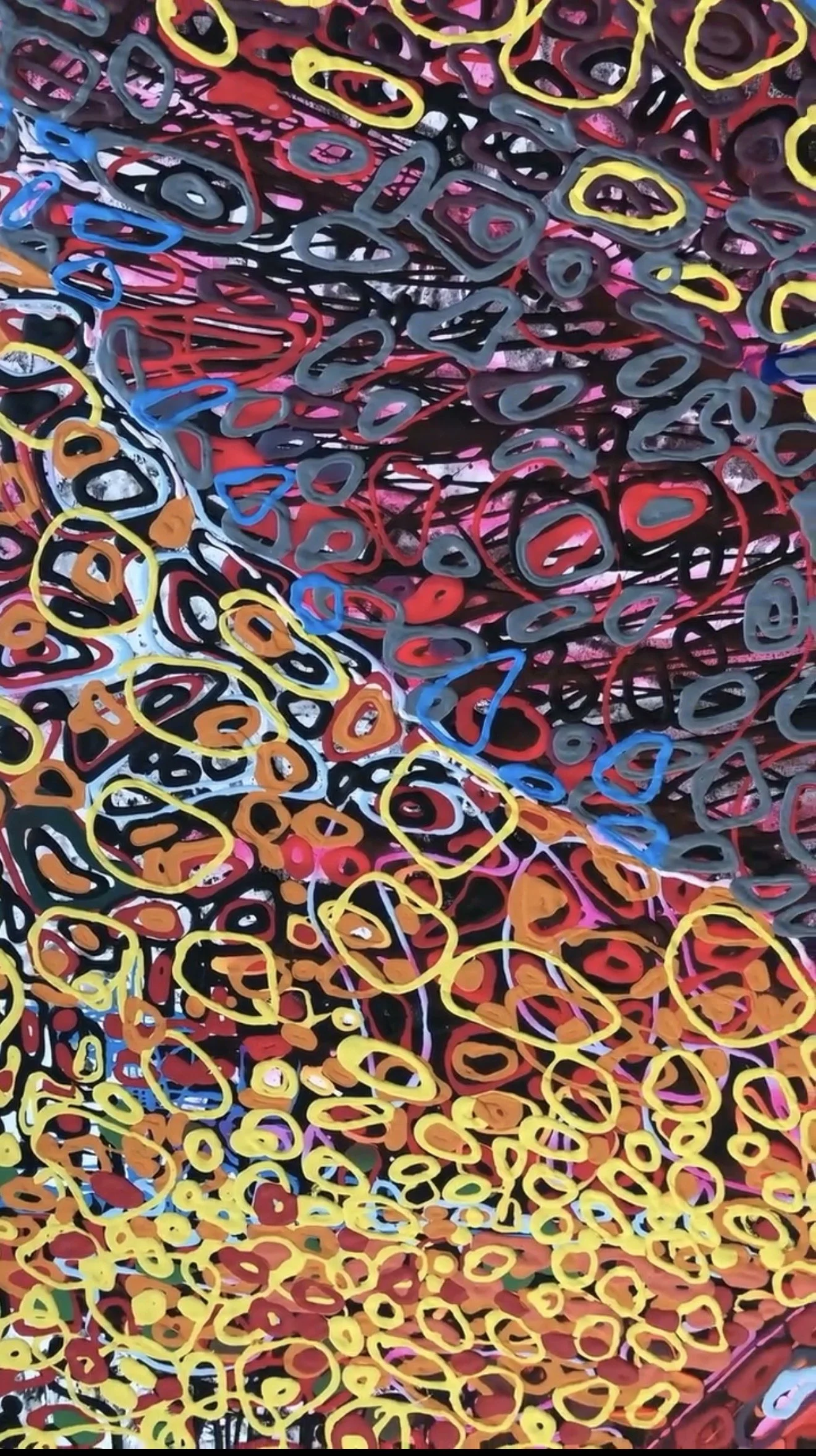 Detail of Leda, 2019 — abstract high-relief surface composed of layered circular and organic forms in red, yellow, blue, and black, forming a dense chromatic field. Signed: Iryna Sushelnytska | SILa