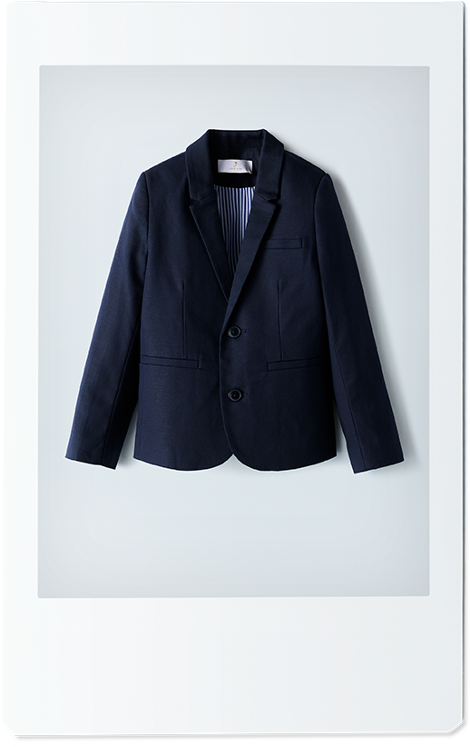 Veste tailleur bleu marine Jacadi présentée de face dans un cadre blanc.
