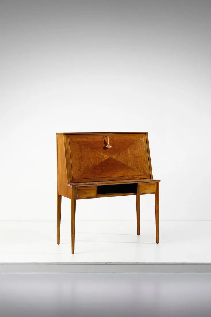 A vintage wooden writing desk with a foldable top and two small drawers, set against a plain white background.
