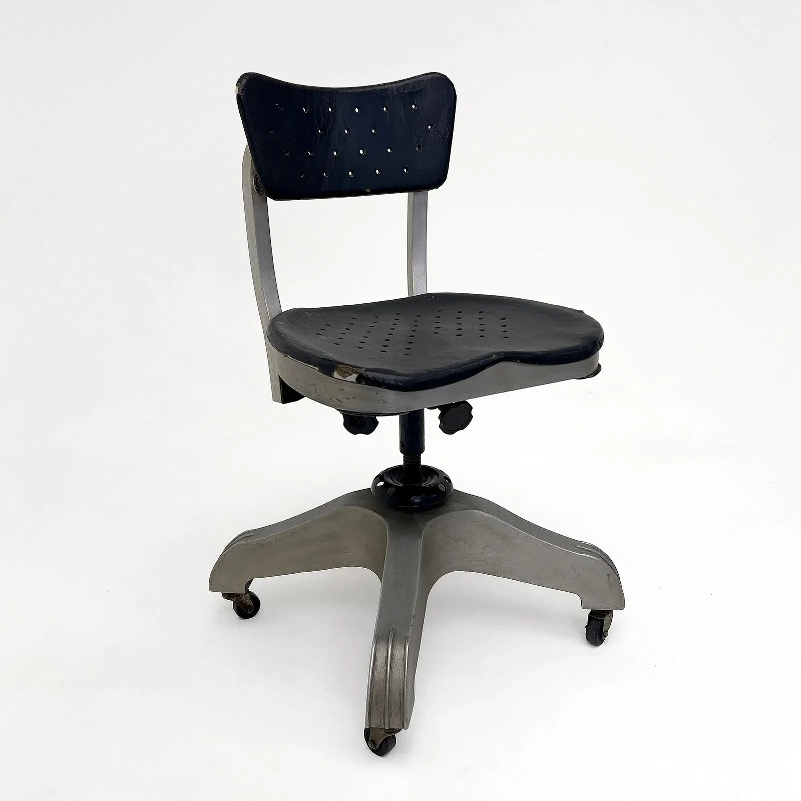 An office chair with a black cushioned seat and backrest, mounted on a metal base with five wheels, against a plain white background.