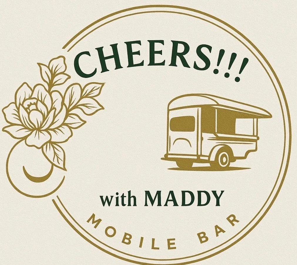 Logo for Cheers! with Maddy Mobile Bar featuring a floral design, a smiling lemon, and a vintage trailer with a pop-up bar, all in gold and green colors.