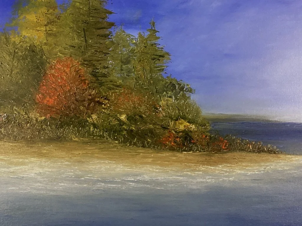 A beach scene with colorful trees and blue sea and sky.
