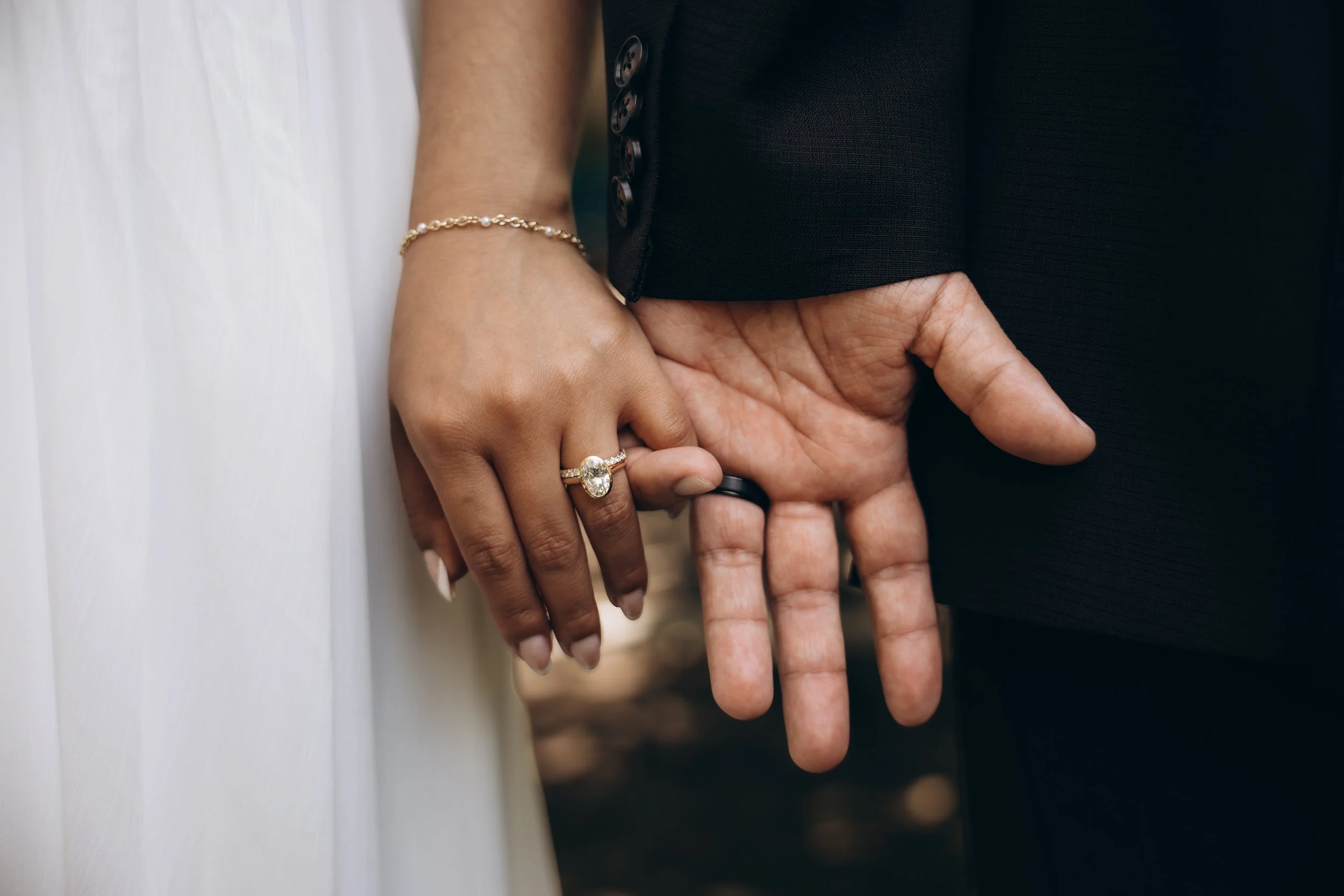 Bride-and-Groom-Holding-Hands-Underneath-Tree-At-Rancho-Los-Alamitos-in Long-Beach-California