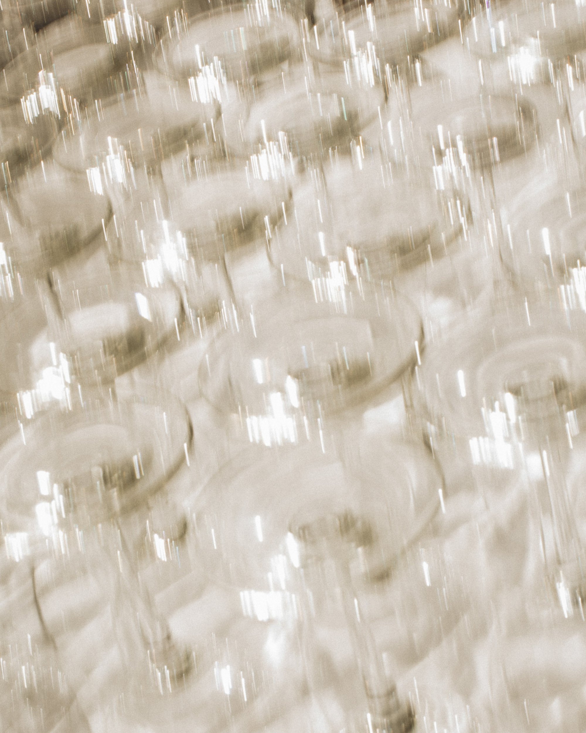 Luxury wedding champagne tower detail photographed during an elegant reception celebration.