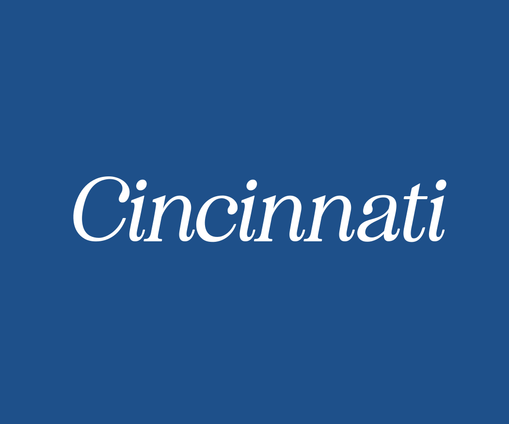 Blue background with white text displaying the word 'Cincinnati' in cursive font.