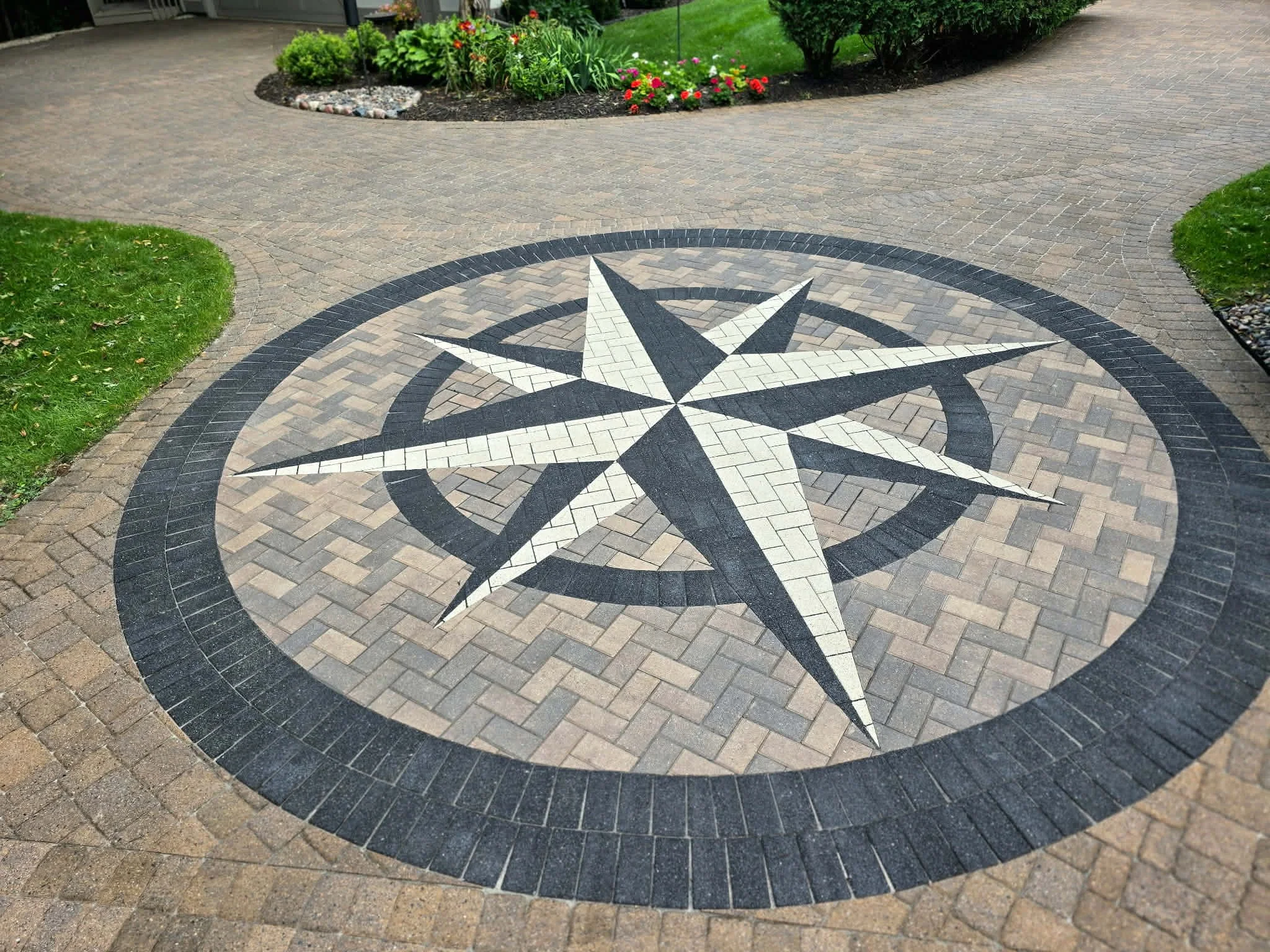 custom paver compass inlay driveway design decorative hardscape mn 