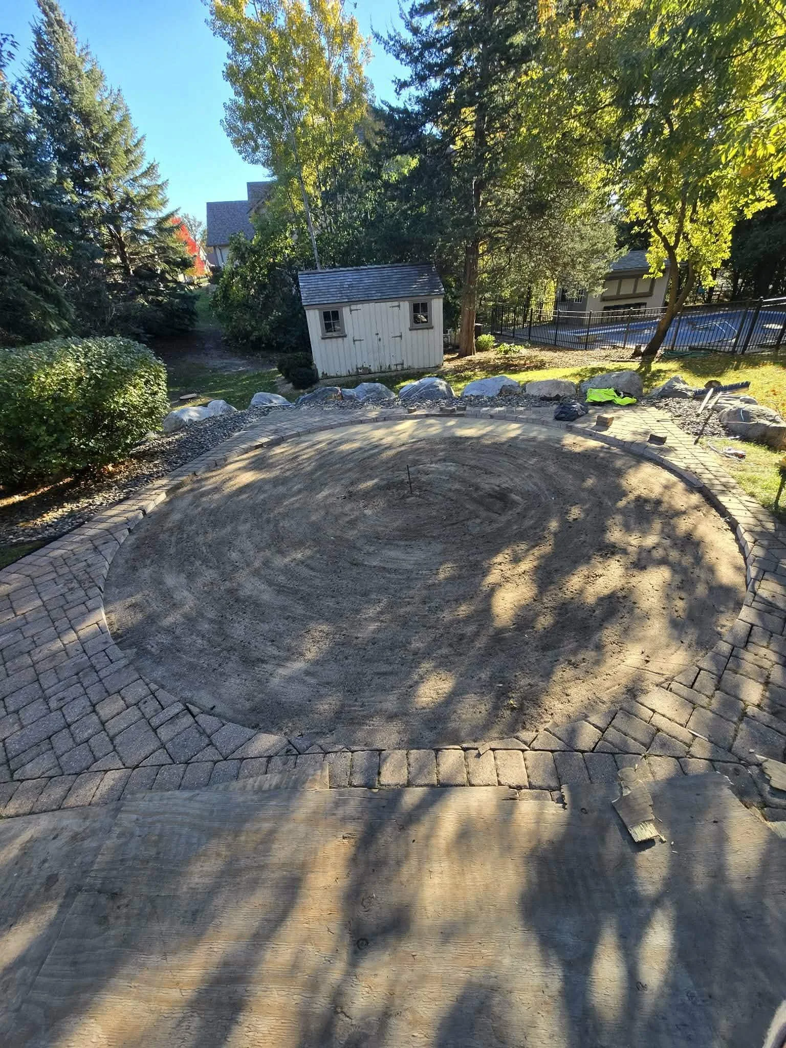 before paver patio installation circular base preparation for custom design Minnesota