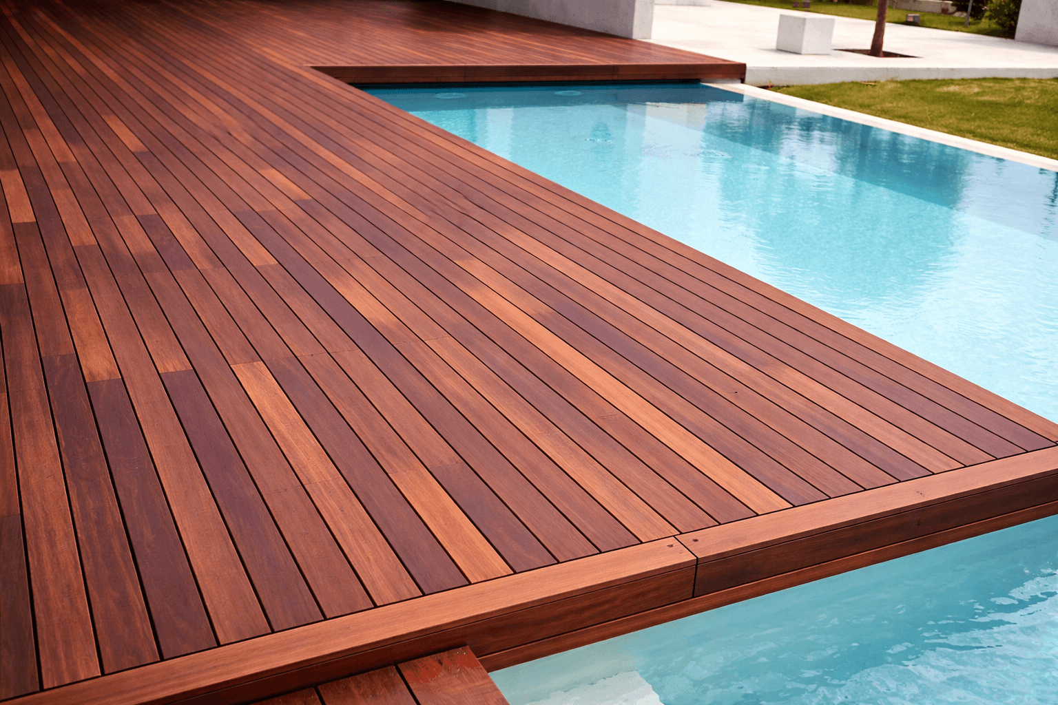 Ipe hardwood deck with rich brown tones next to swimming pool in liberty hill texas