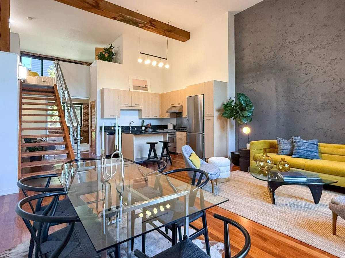 Soaring ceilings, wood floors with radiant heat, exposed redwood beams.  