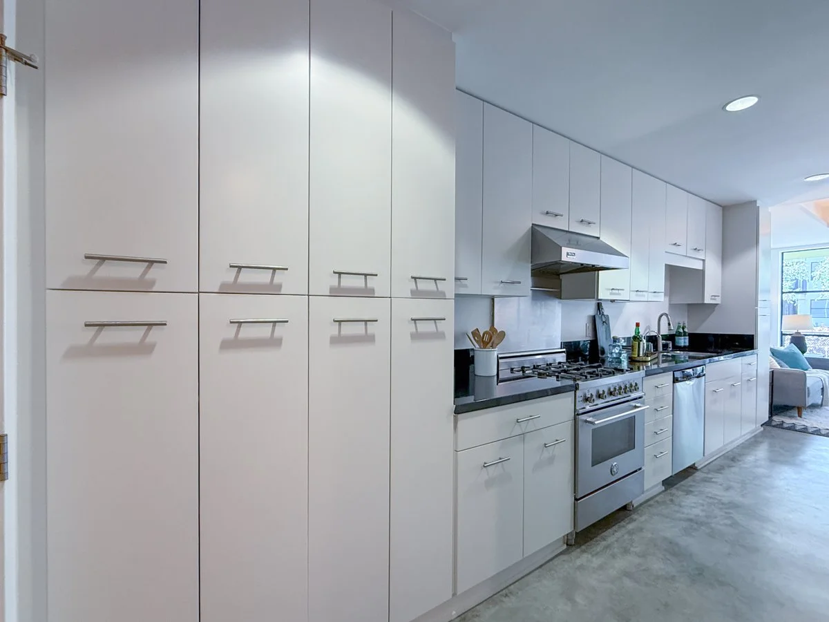 Lots of cabinets in kitchen. 