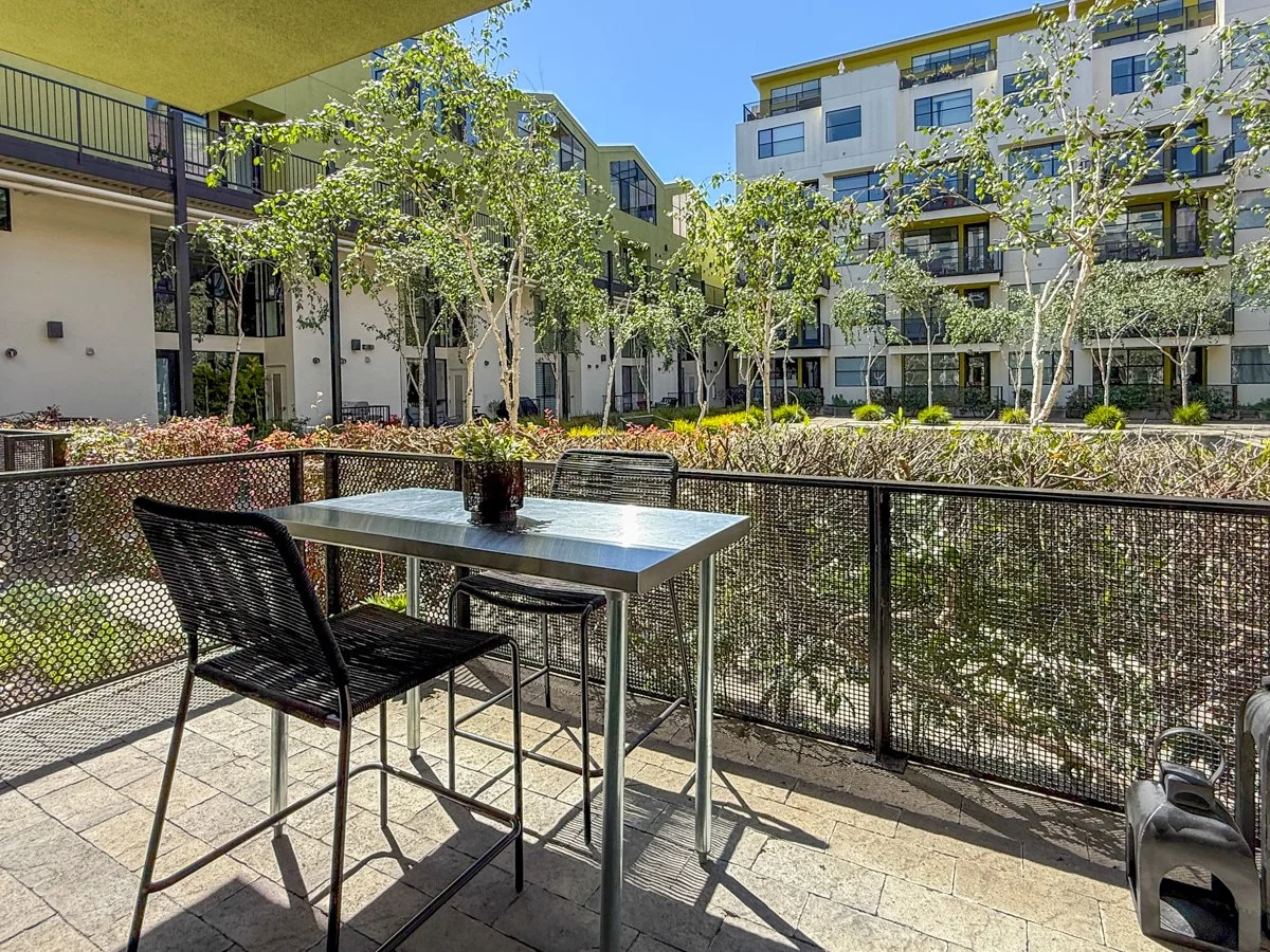 Private patio with South Court views. 