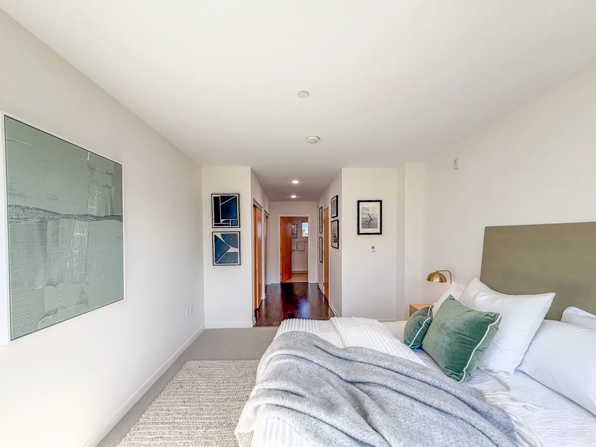 Primary suite with hallway to en-suite bath. 