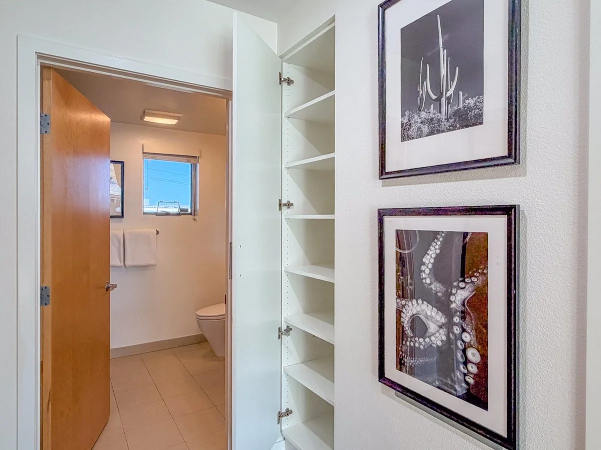 En-suite bath with linen closet. 