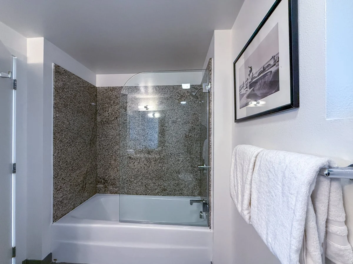 Shower over tub in en suite bathroom