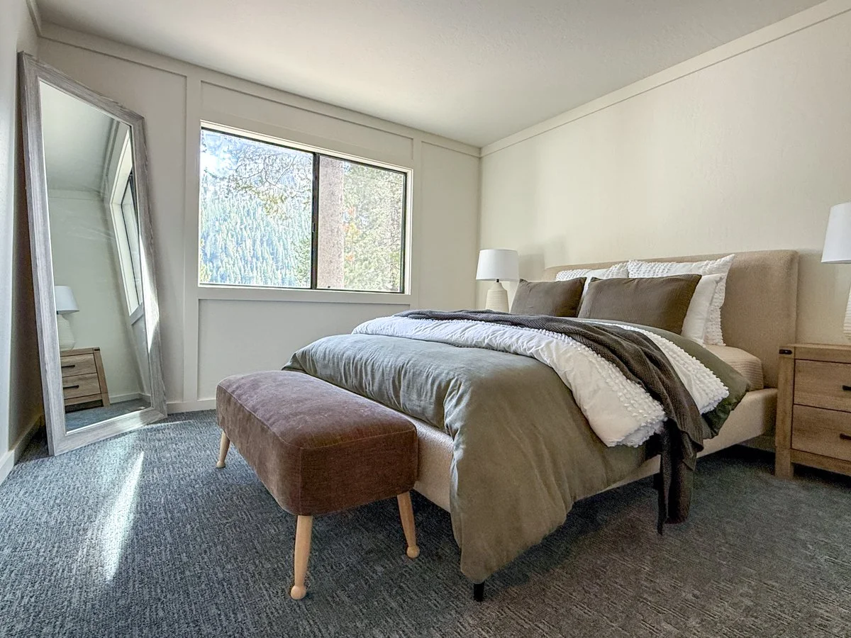 Primary bedroom with new carpet. 