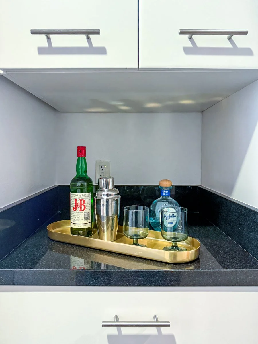 Bar area inset in cabinets.