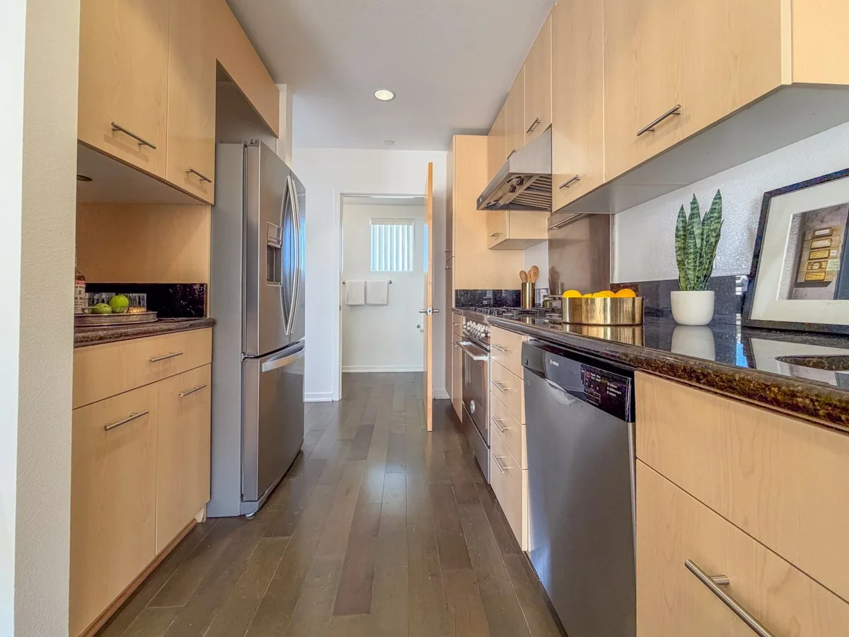 Kitchen with Stainless Steel appliances. 