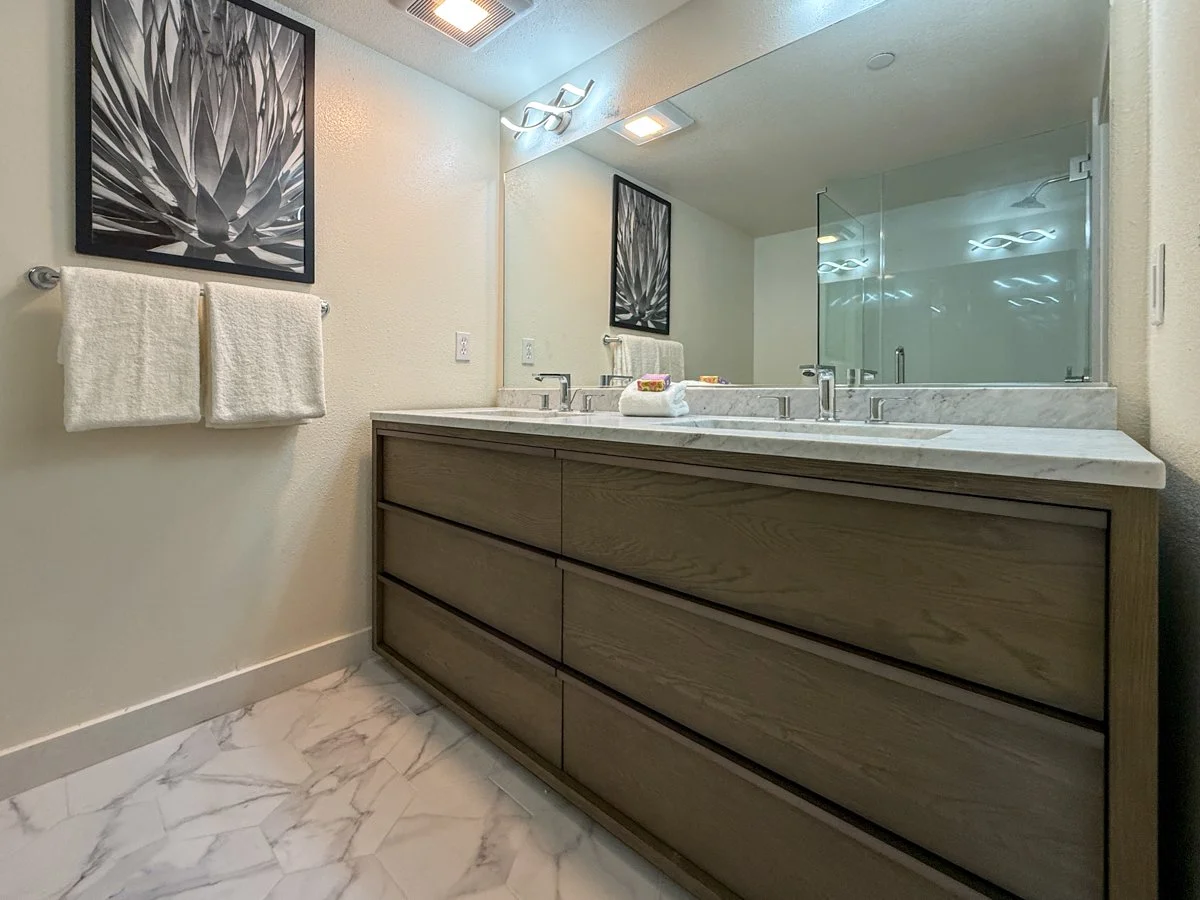 Totally remodeled upstairs bathroom with quartz counter, double sink RH vanity. 
