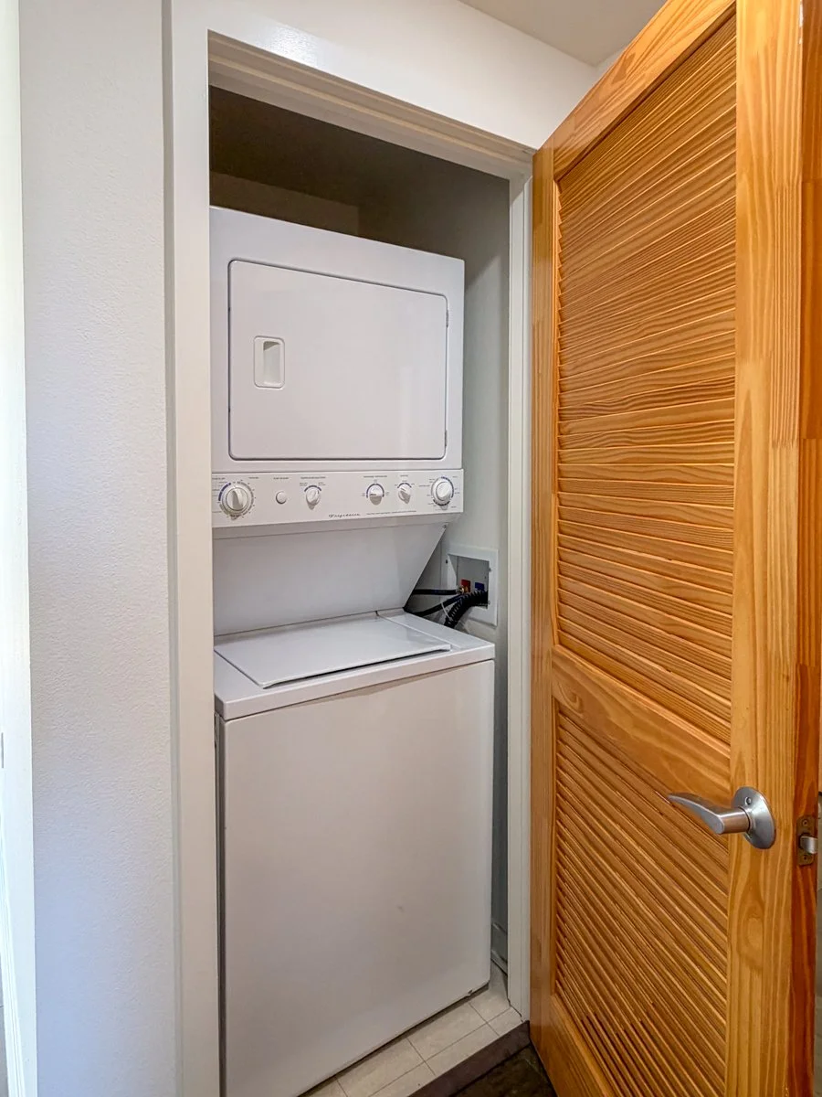 Laundry closet in the unit. 