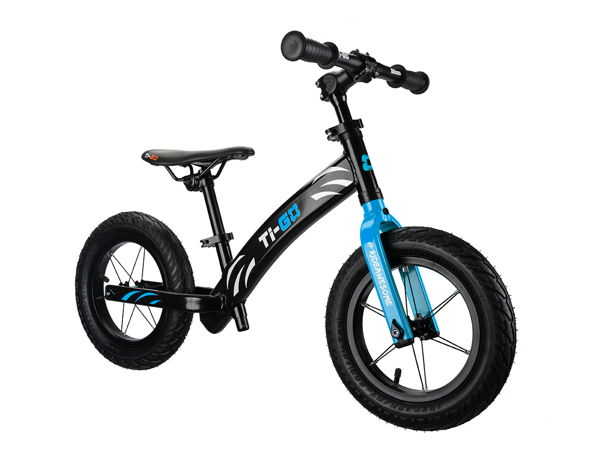 Black and blue children's balance bike with thick tires, featuring the label T1 G6 and hashtag #REMAKESOME on the front fork.