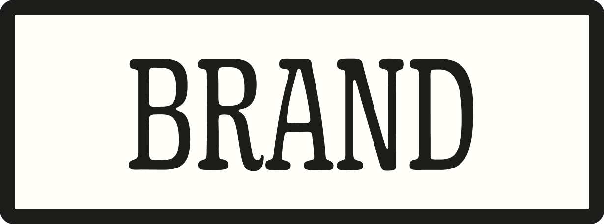 Black and white sign with the word 'BRAND' in bold capital letters