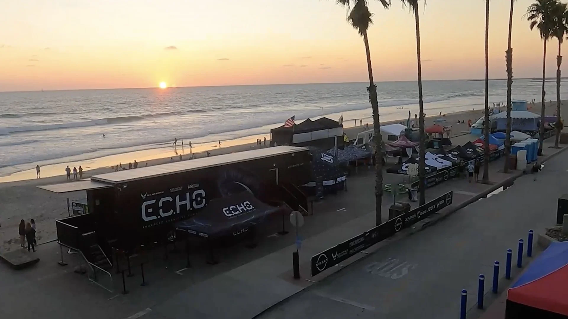 U.S. Air Force Project E.C.H.O. recruiting event activation on a beach at sunset