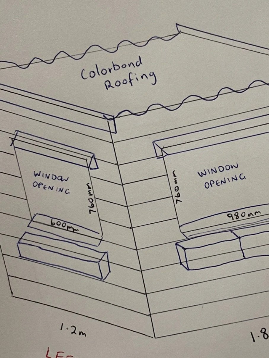 Sketch of a building corner with two window openings, labeled with dimensions, and a roof labeled as 'Colorbond Roofing'.