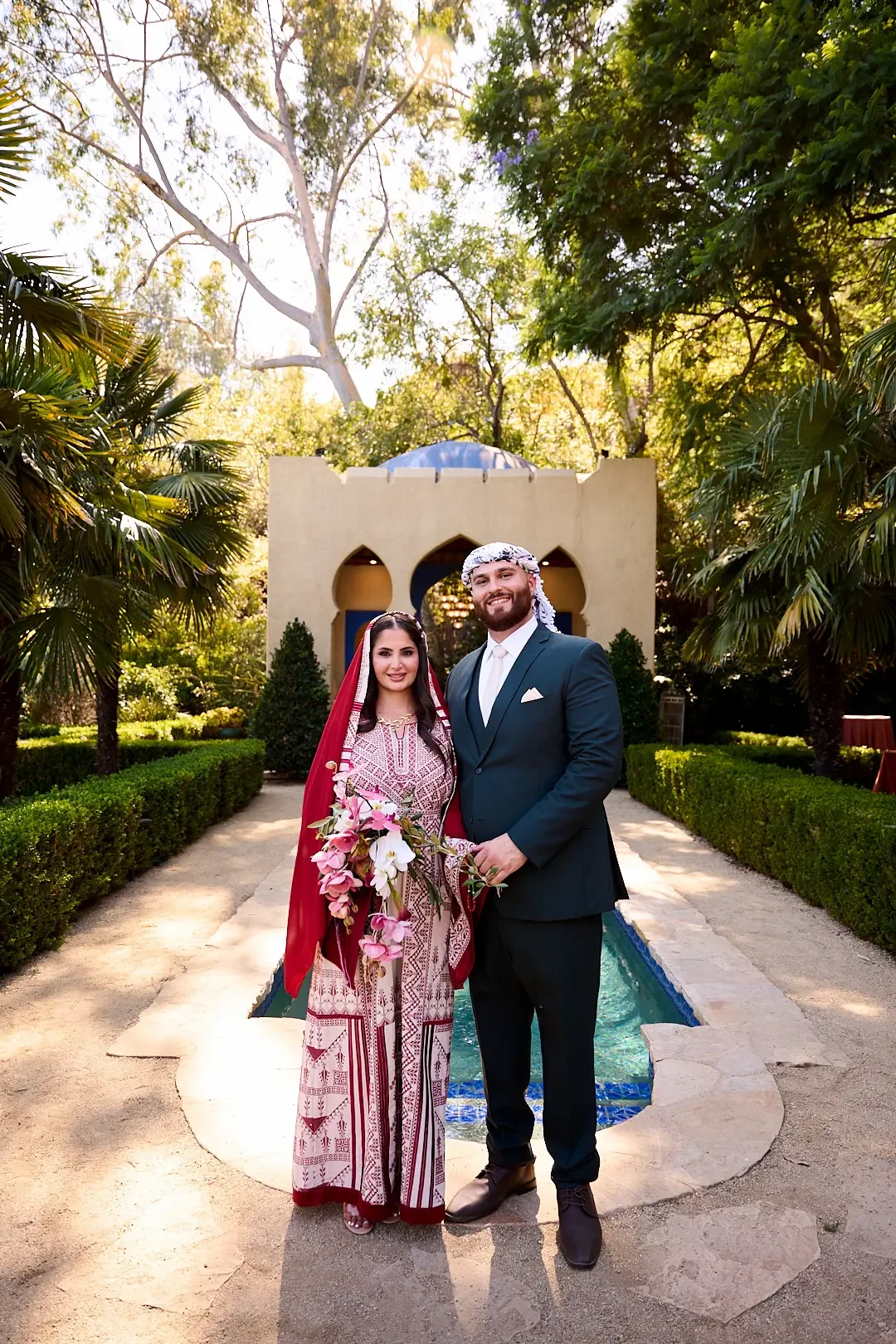 Middle Eastern bride and groom posing in the garden at XOHH Events, a private wedding venue in the Hollywood Hills, Los Angeles.