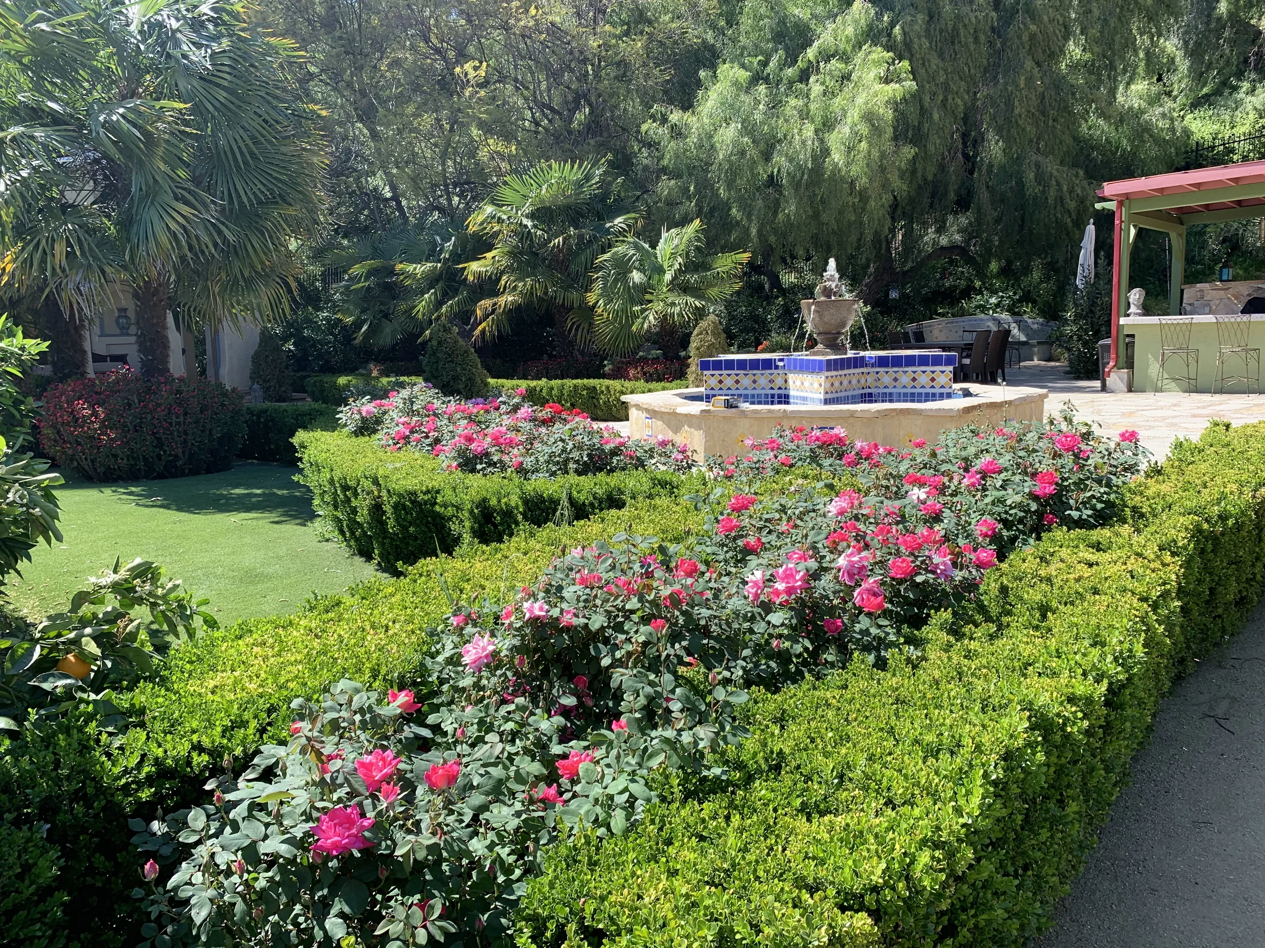 XOHH Water Fountain in lush garden