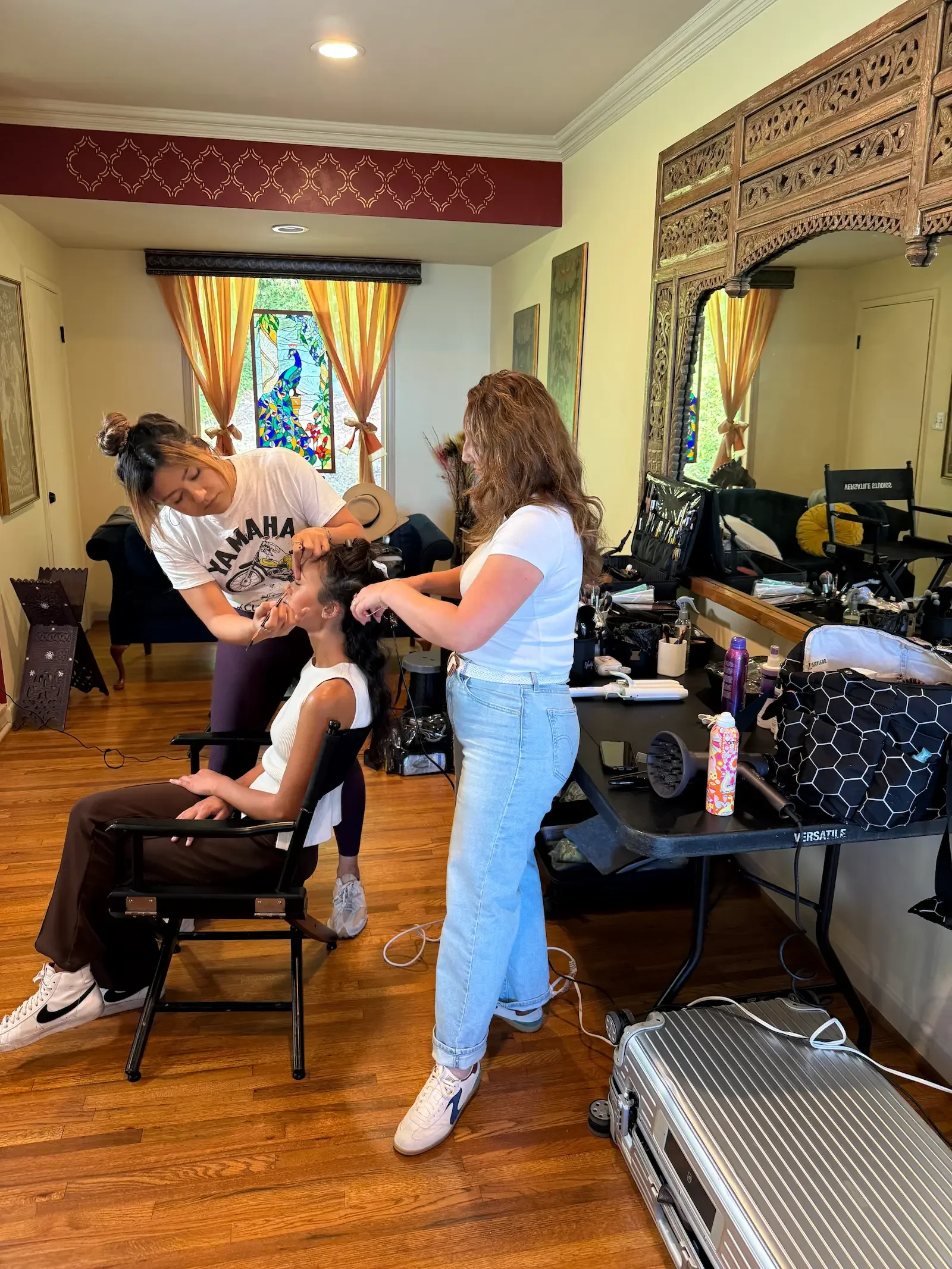 Behind-the-scenes hairstyling for an actress during the People magazine production featuring Helen Mirren.