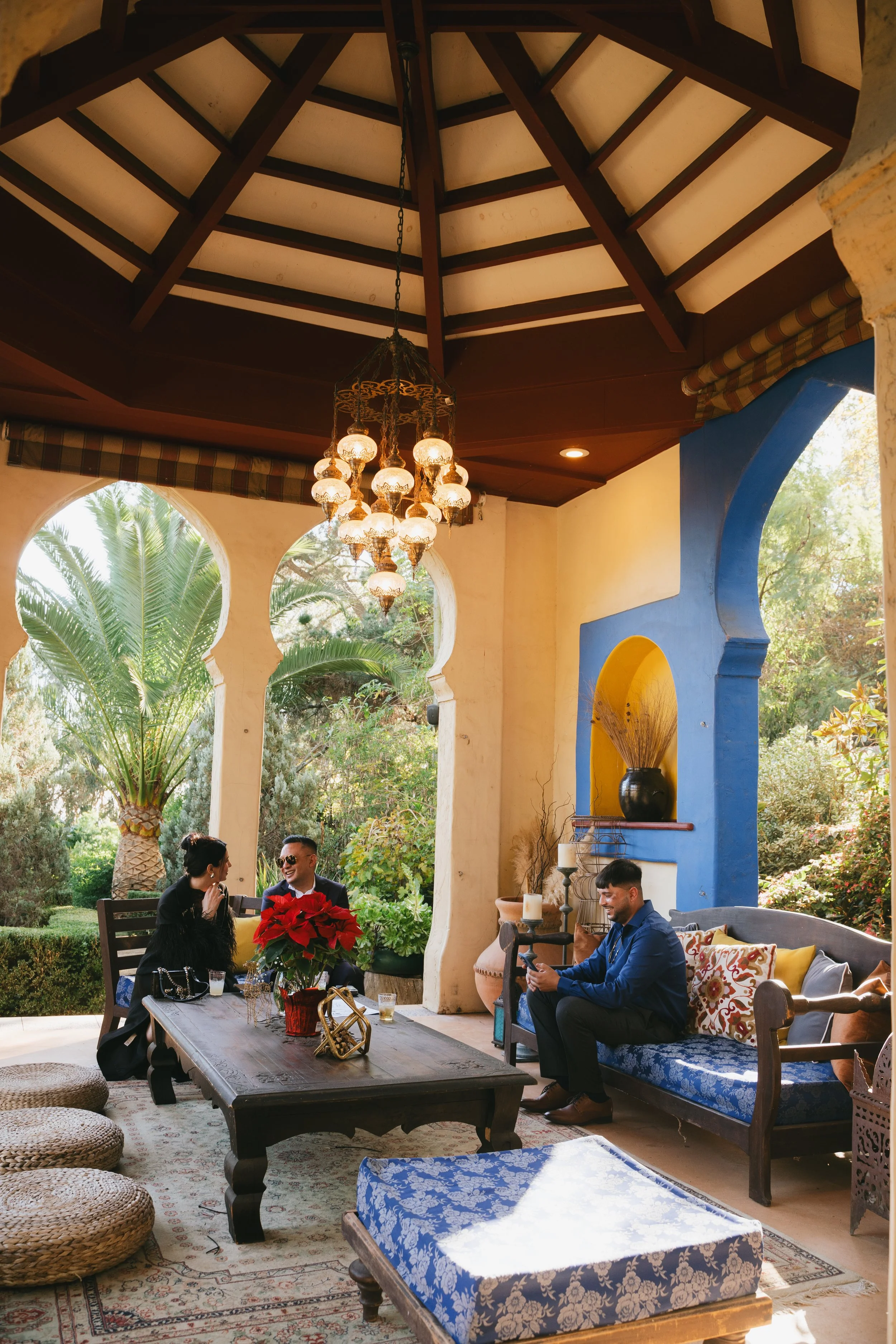 Production crew and floral styling in the Moroccan pavilion lounge