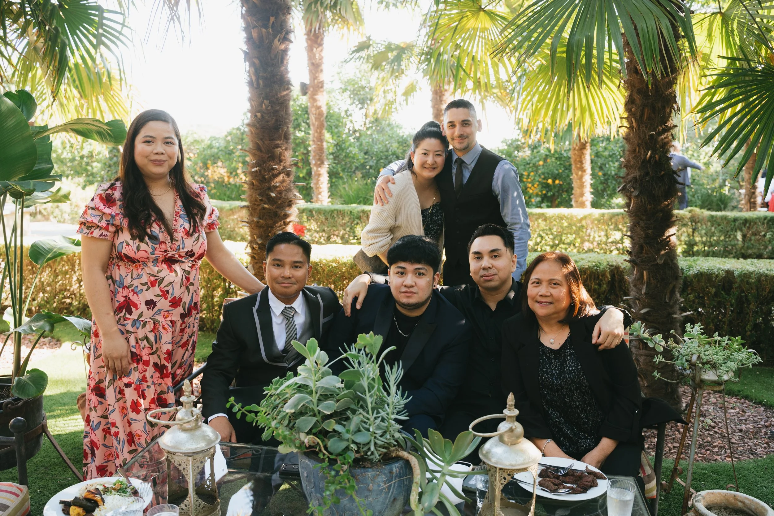 Family group portrait posed in the estate gardens