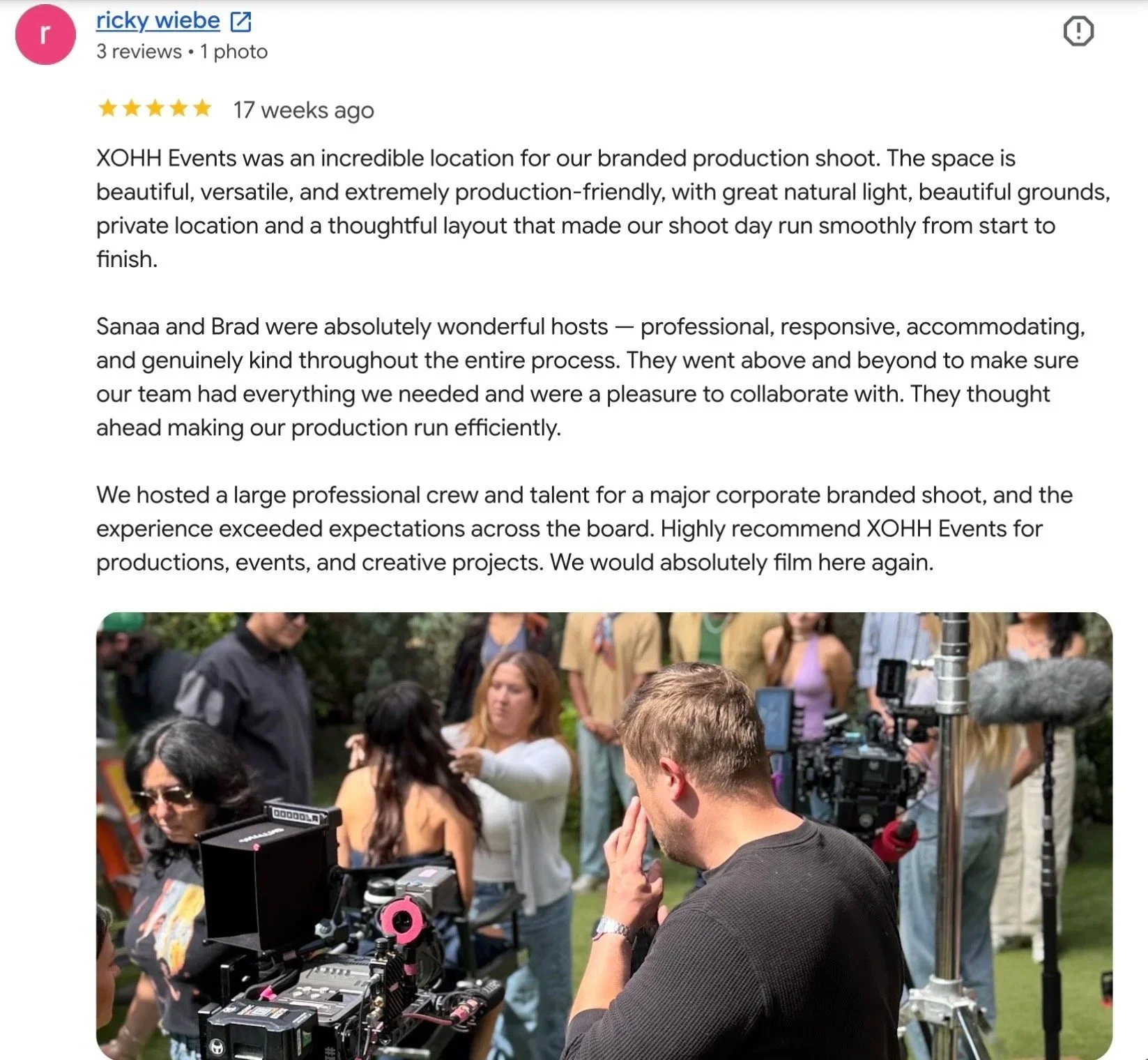 behind-the-scenes branded production at XOHH Events with a professional camera crew, monitors, lighting equipment, and talent in garden.