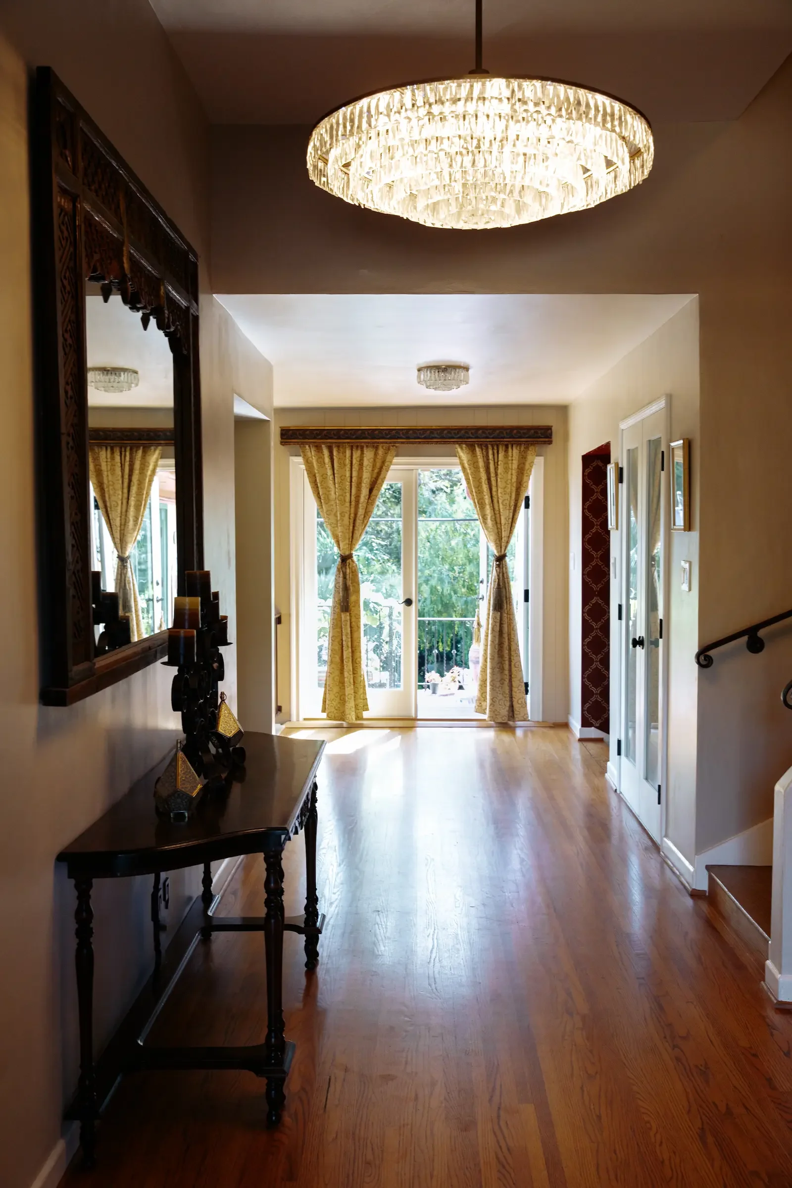 Interior hallway connecting the Grand Salon and production spaces at the private Hollywood Hills estate.