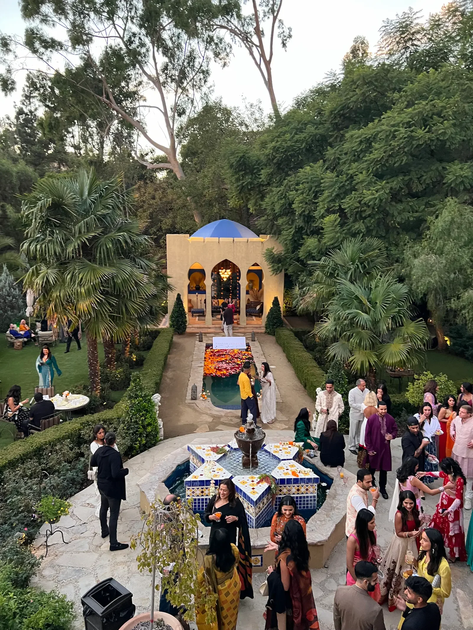 Guests gathering for a Diwali celebration and jewelry launch at XOHH Events, a private outdoor event venue in the Hollywood Hills, Los Angeles.