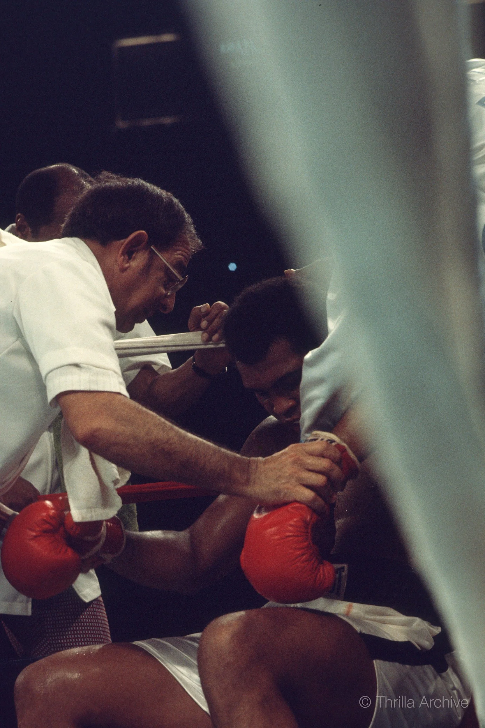 Muhummad Ali depleted and exhausted in his corner between rounds of his violent showdown against Joe Frazier in the Thrilla in Manila, October 1975