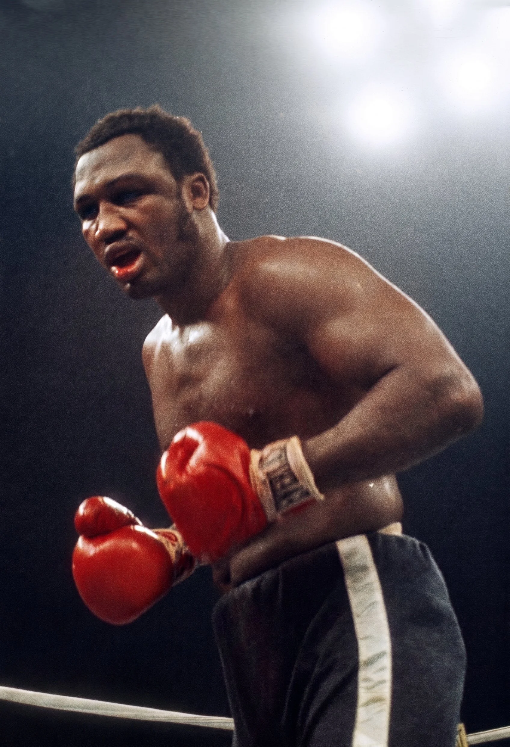 Bloodied and exhausted Joe Frazier presses forward during the late rounds of Ali-Frazier III, the Thrilla in Manila.