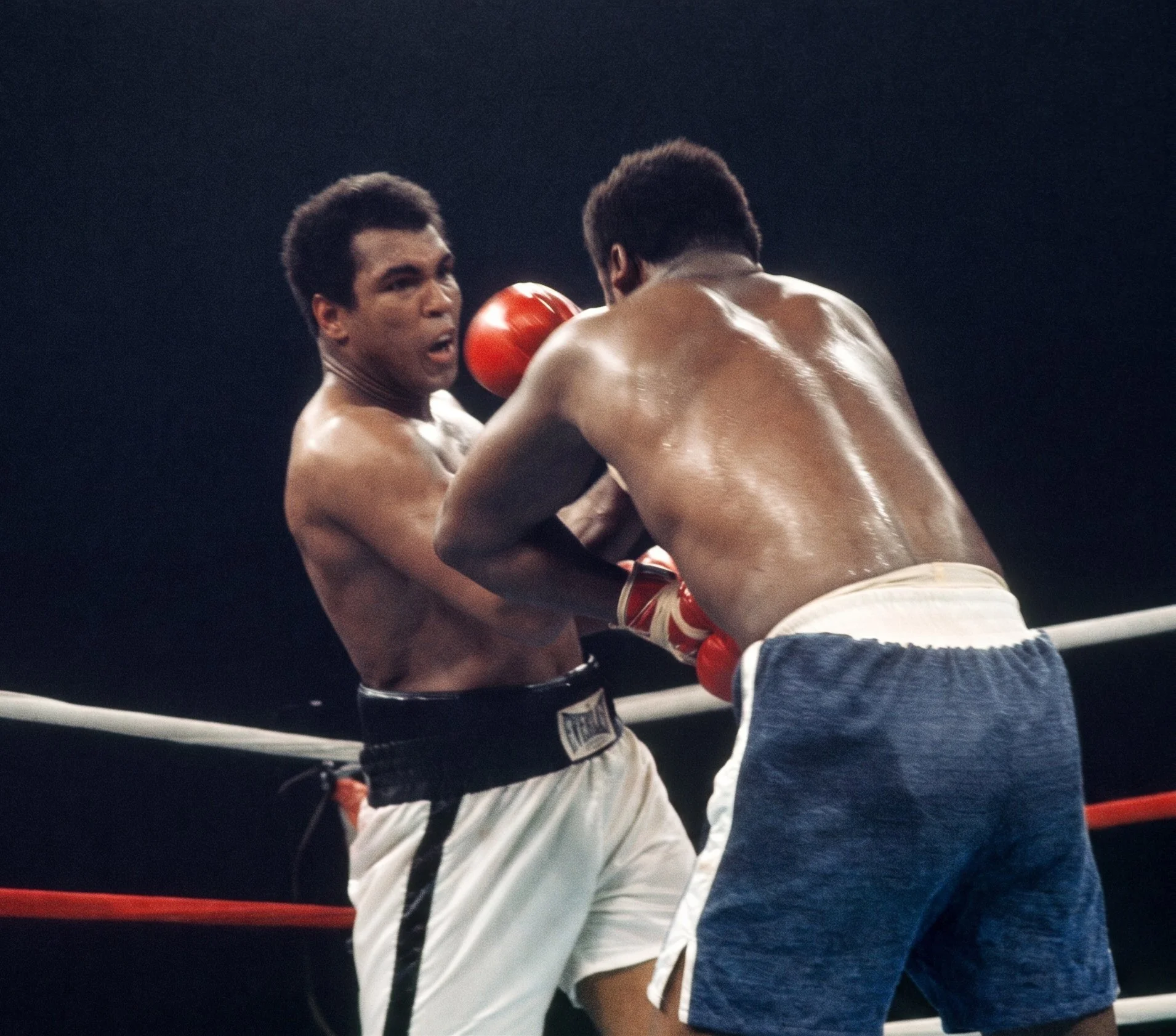 Muhammad Ali attacks Joe Frazier at close range with an apparent right uppercut during the late rounds of the Thrilla in Manila.