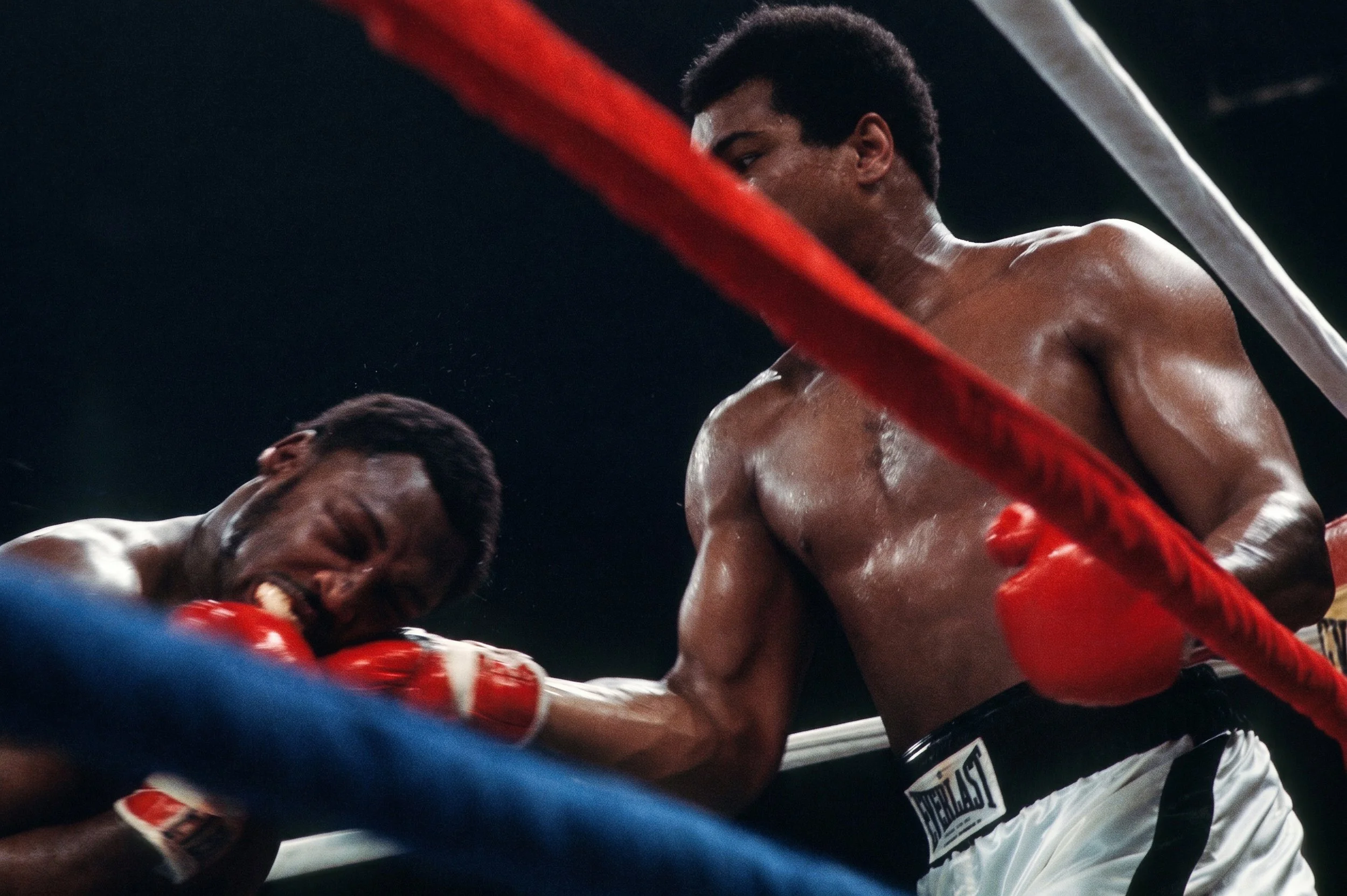 Muhammad Ali lands a right uppercut to Joe Frazier’s jaw at close range in the corner during Ali-Frazier III, the Thrilla in Manila.