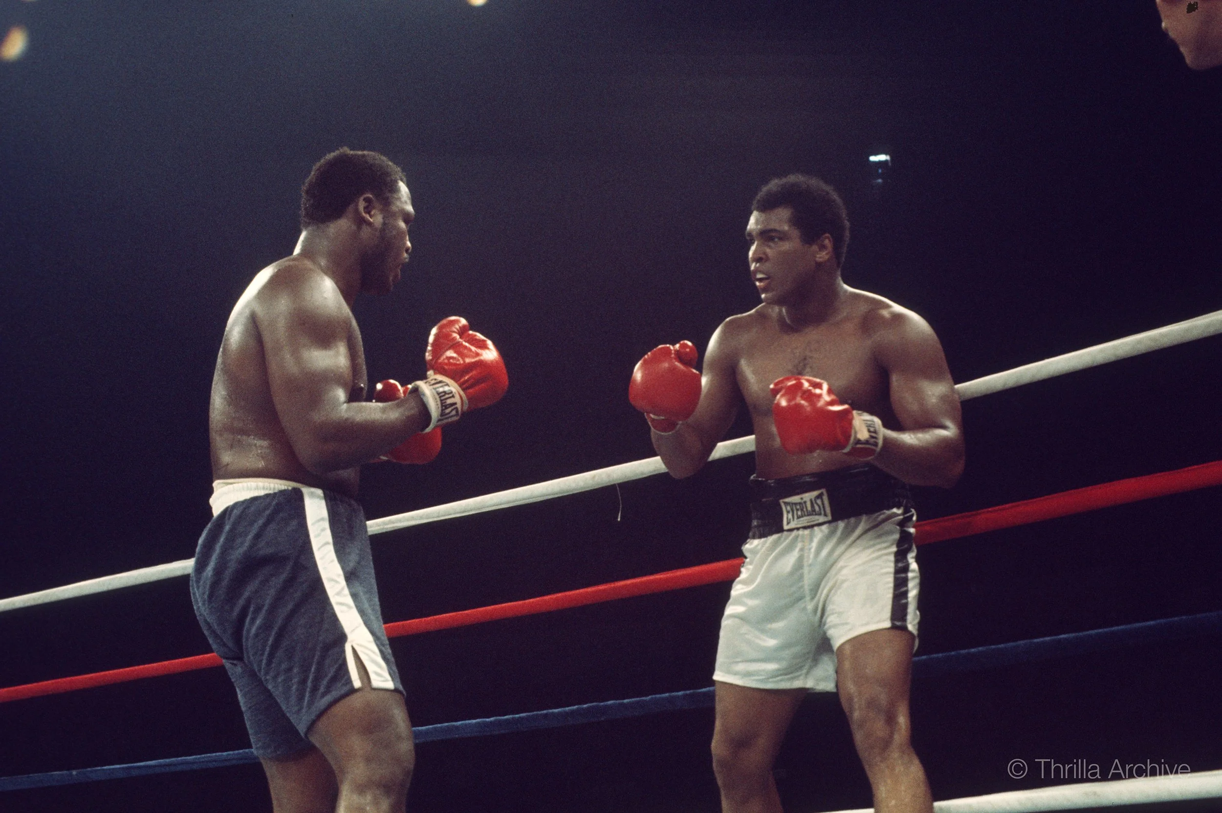 Early tension in the ring between Muhammad Ali and Joe Frazier during the Thrilla in Manila fight, 1975, photographed by Lowell K. Riley