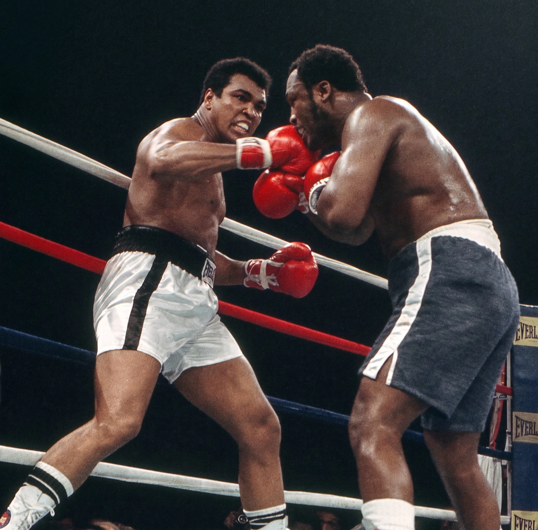 Muhammad Ali fights off the ropes and lands a right hand to Joe Frazier’s chin during Ali-Frazier III, the Thrilla in Manila.