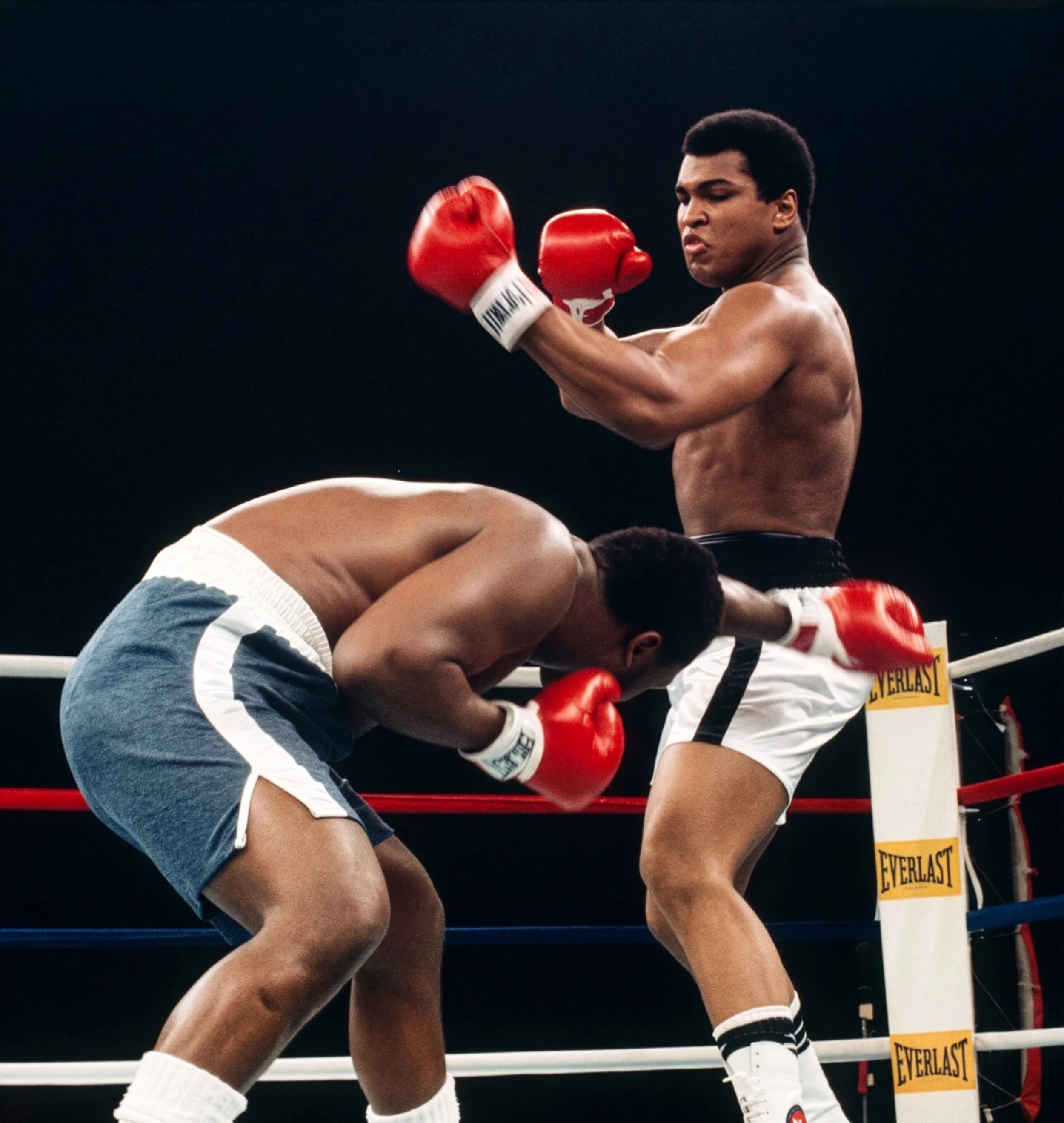 Joe Frazier comes in low beneath Muhammad Ali at close range as Ali’s left misses during Ali-Frazier III, the Thrilla in Manila.