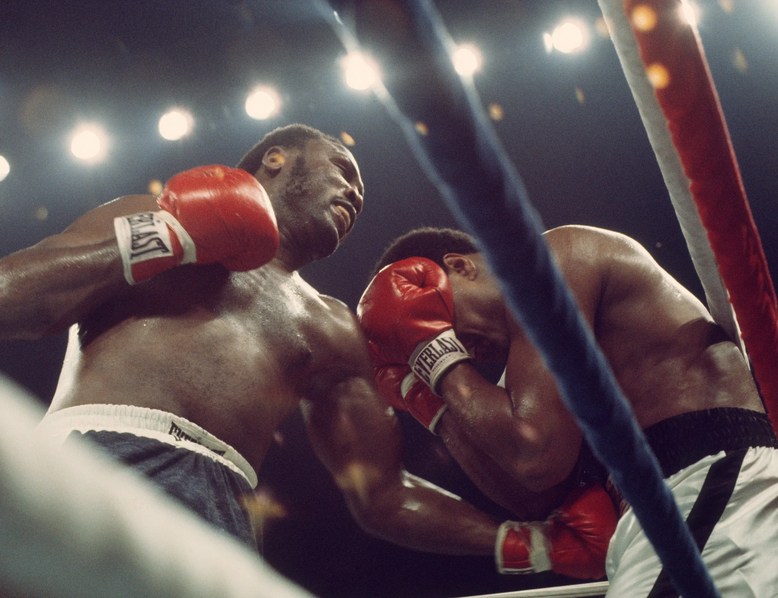 Joe Frazier digs a left to the body of Muhammad Ali during the Thrilla in Manila. Photograph from the Thrilla Archive featured in The Ring Magazine photo essay by Thomas Hauser.