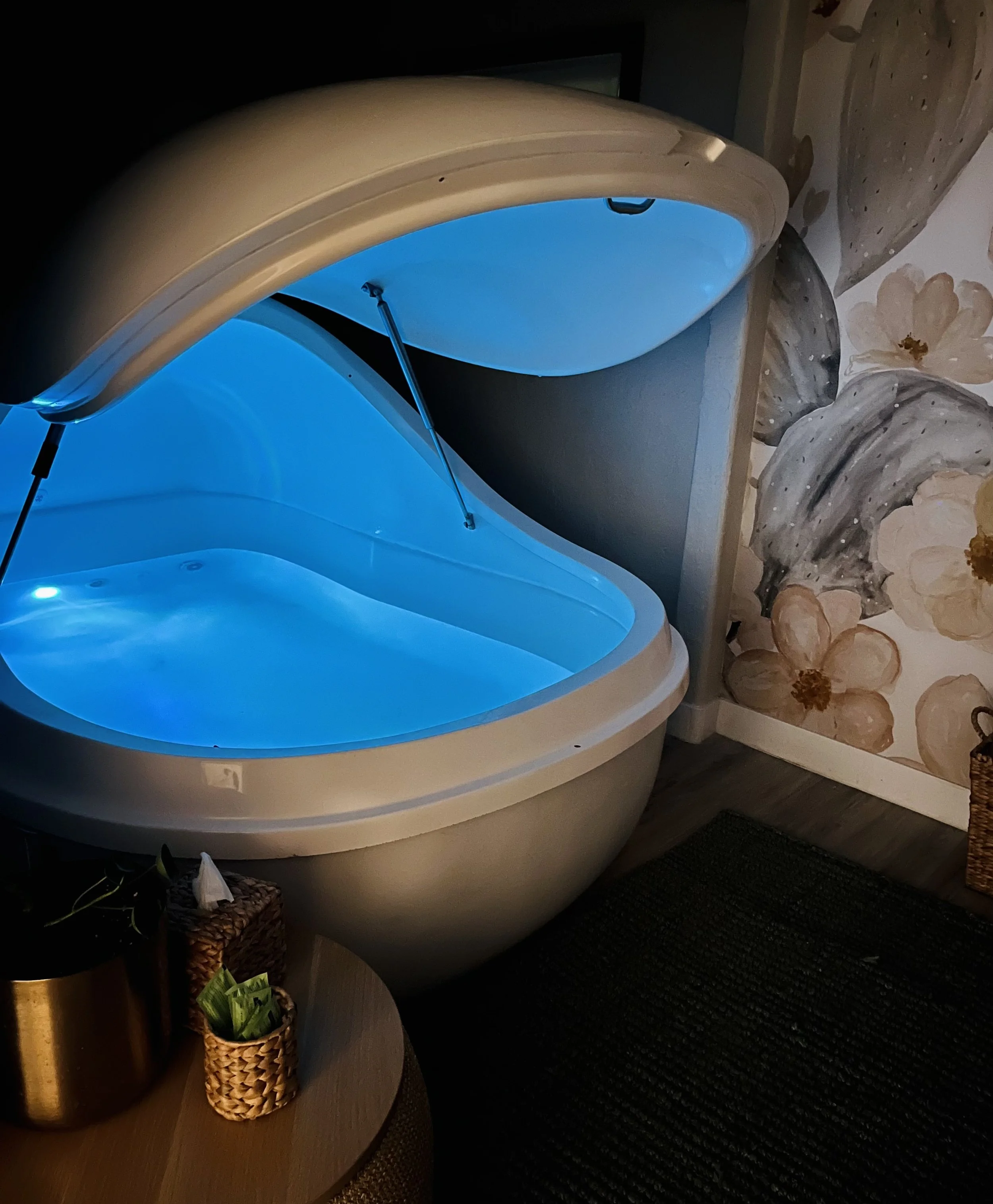 Private float therapy tank in the Float Suite at Stillpoint Wellness in North Phoenix, Arizona, offering a peaceful sensory relaxation and flotation experience.