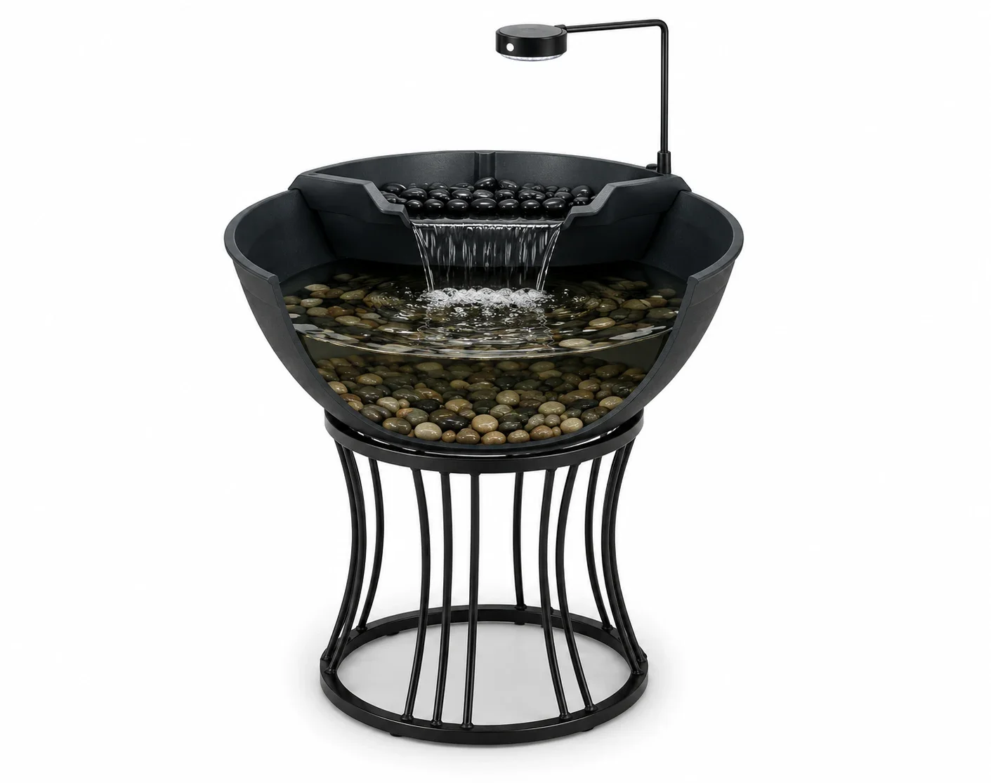 A tabletop water fountain with black stones, water flowing over black spheres, a small black water spout, and a black metal stand.