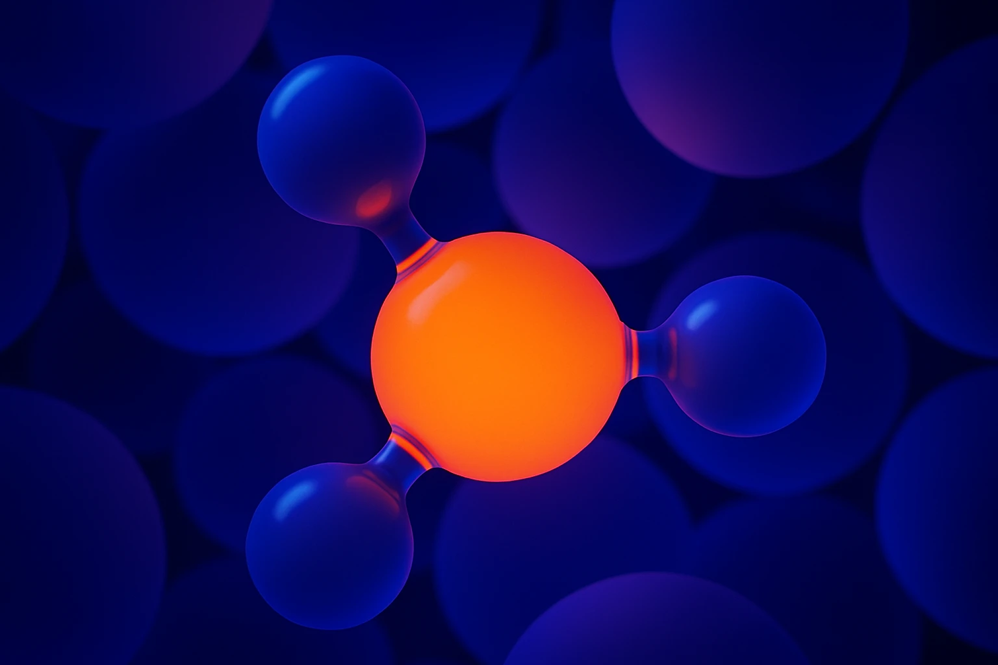 Close-up of connected ammonia molecule with blue and orange spheres on a dark background.
